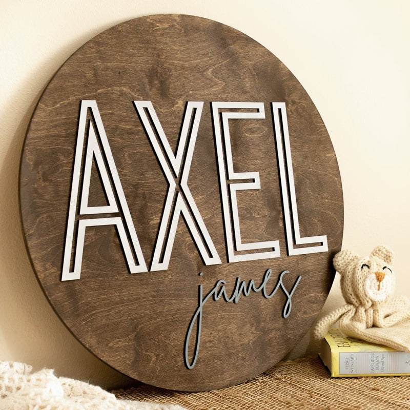 baby name sign on dresser in nursery